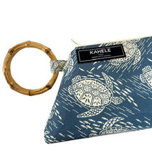 Load image into Gallery viewer, close up of the natural bamboo handle side of the wristlet