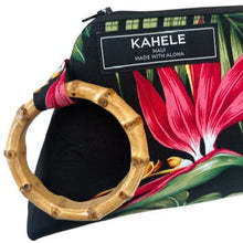 Load image into Gallery viewer, Detail of natural bamboo handle and Kahele Maui label on a Maui Tai Cutch with a red bird of paradise