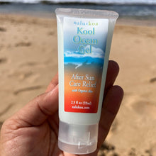 Load image into Gallery viewer, A 2.5 oz tube of Kool Gel, After Sun Care one the beach
