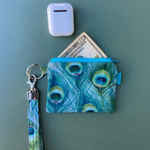 Load image into Gallery viewer, Peacock print coin bag with attached wrist strap. Holds money and airpods. 
